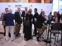 141 Exhibit Hall  Attendees networking in exhibit booth