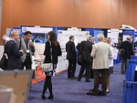 142 Exhibit Hall  Attendees networking on show floor