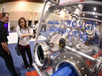 144 Exhibit Hall  Attendee engagement in exhibitor booth