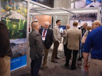 147 Exhibit Hall  Attendees networking in exhibit booth