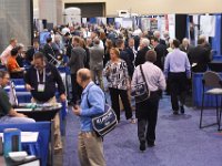 148 Exhibit Hall  Attendees visiting the exhibitors