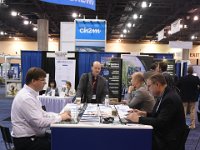 149 Exhibit Hall  Attendees conducting business on the show floor
